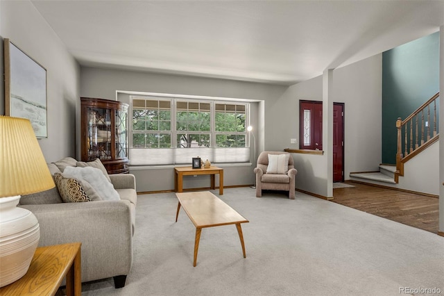 6285 Moccasin Pass Ct, Colorado Springs, CO 80919 - living room featuring carpet and stairs