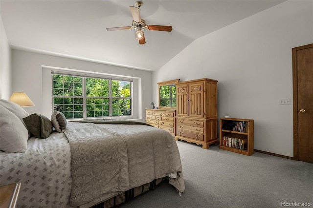 6285 Moccasin Pass Ct, Colorado Springs, CO 80919 - carpeted bedroom with lofted ceiling, multiple windows, and a ceiling fan