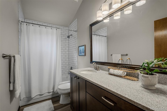 6285 Moccasin Pass Ct, Colorado Springs, CO 80919 - bathroom featuring vanity, shower / bath combo, and wood finished floors