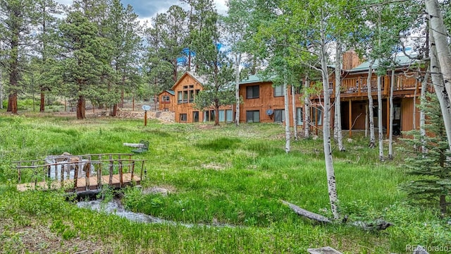 view of yard with a deck