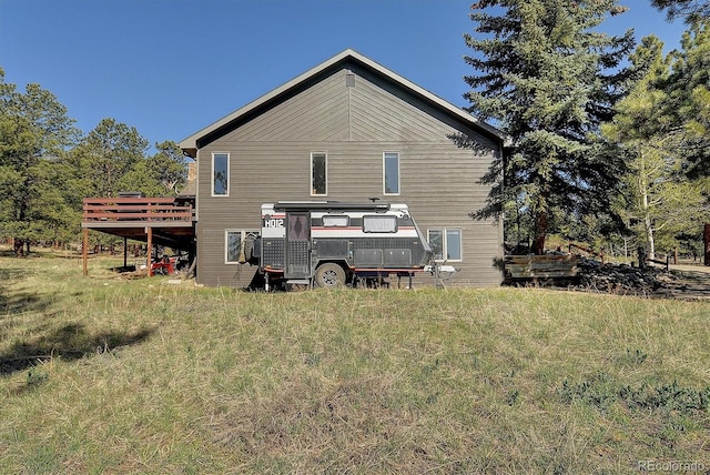 18360 Trail W Dr, Buena Vista, CO 81211 - rear view of house with a wooden deck