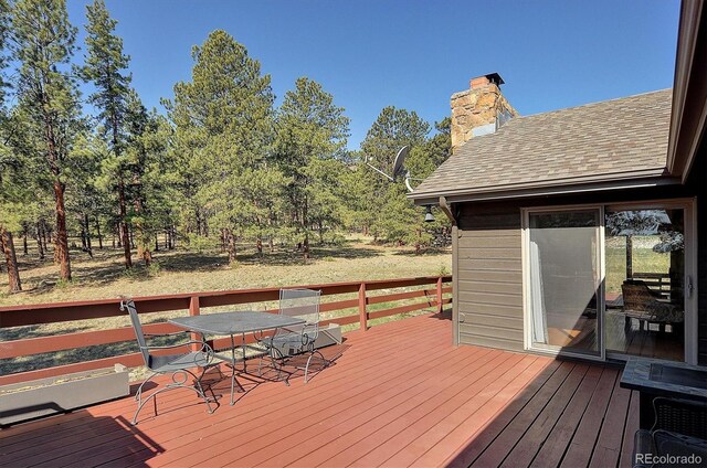 18360 Trail W Dr, Buena Vista, CO 81211 - wooden terrace with outdoor dining area