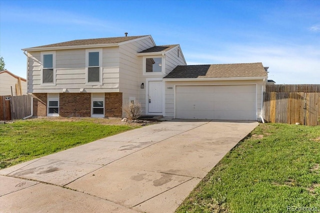 1488 S Andes Way, Aurora, CO 80017 - split level home with an attached garage, driveway, brick siding, and roof with shingles