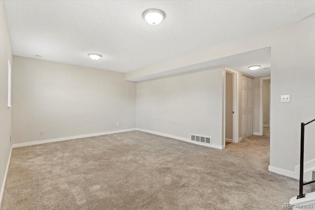 1488 S Andes Way, Aurora, CO 80017 - finished basement with carpet floors, a textured ceiling, and baseboards