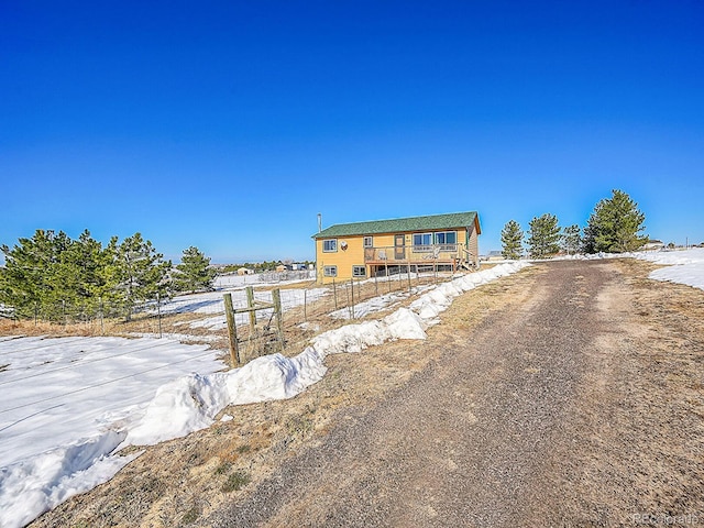 view of front of home with a deck