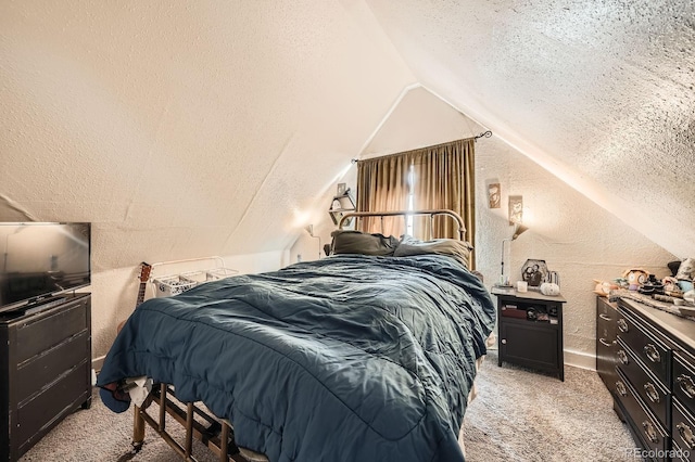 bedroom featuring a textured wall, light carpet, a textured ceiling, and lofted ceiling
