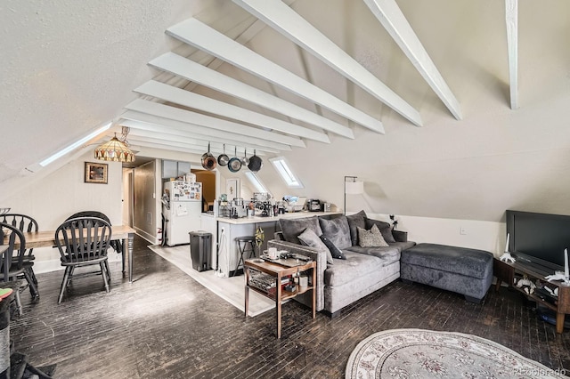 living area featuring vaulted ceiling with beams and wood-type flooring