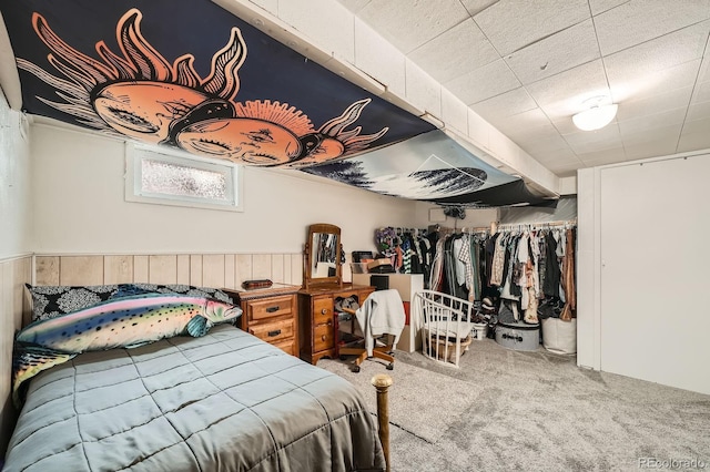 carpeted bedroom featuring a closet