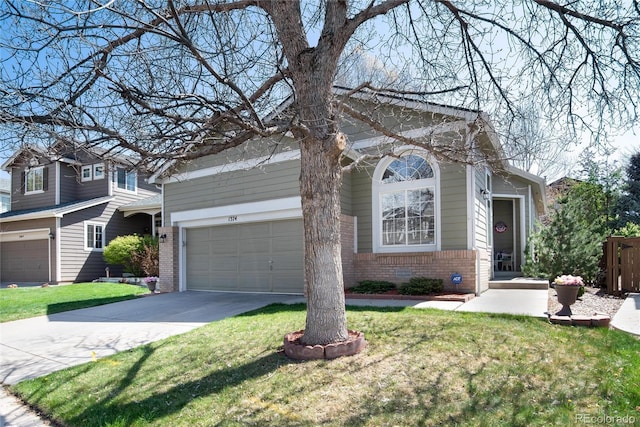 view of front of home featuring brick siding, a garage, a front yard, and concrete driveway