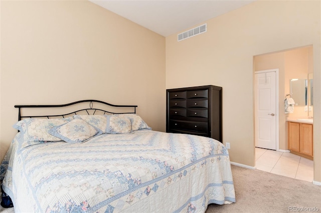 bedroom featuring visible vents, carpet, and baseboards