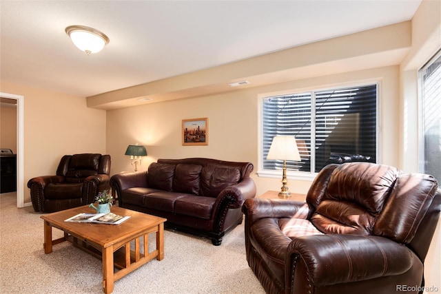 living area with light carpet and visible vents