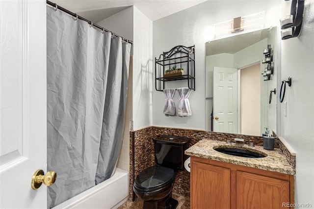 full bathroom with shower / bath combo with shower curtain, toilet, and vanity