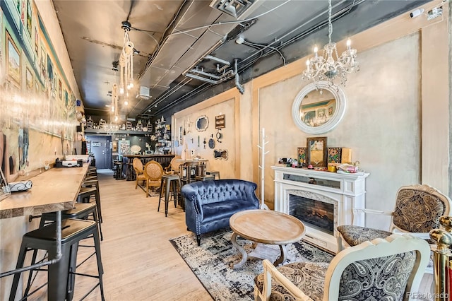 interior space featuring a high end fireplace and light wood-type flooring