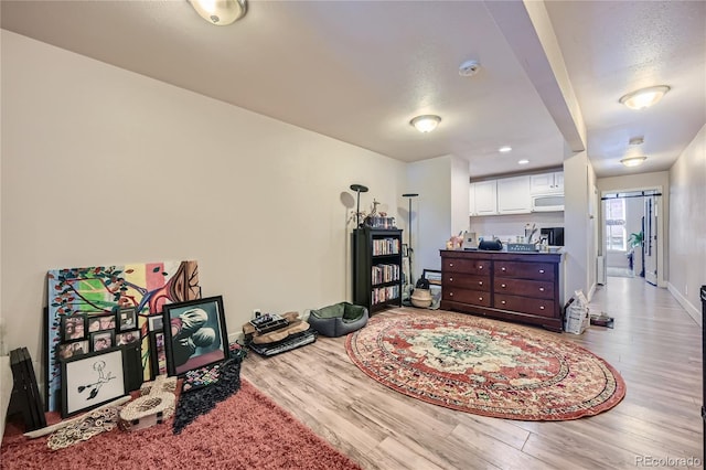 bedroom with light wood-type flooring