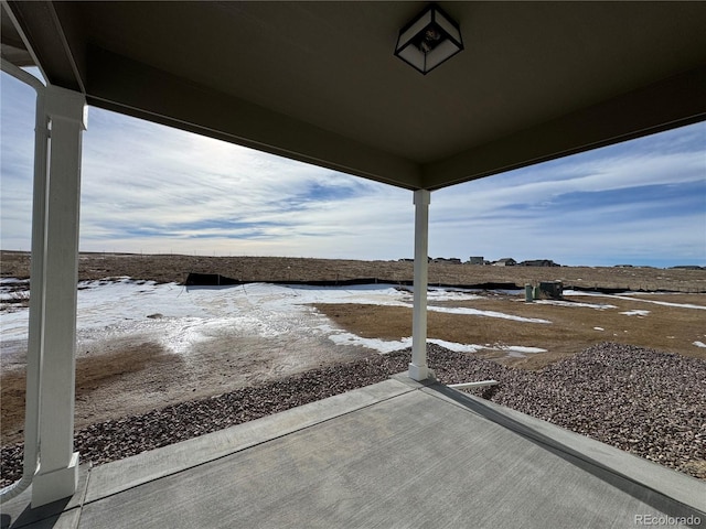 view of snow covered patio