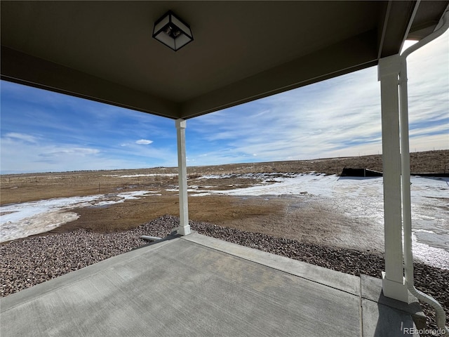 view of snow covered patio