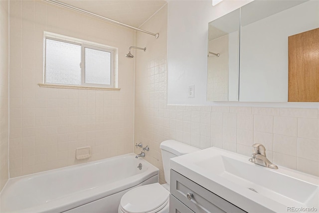 260 Flint Way, Broomfield, CO 80020 - full bathroom featuring toilet, tile walls, tub / shower combination, vanity, and backsplash