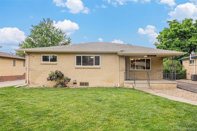 260 Flint Way, Broomfield, CO 80020 - single story home with brick siding, covered porch, a front yard, and central AC