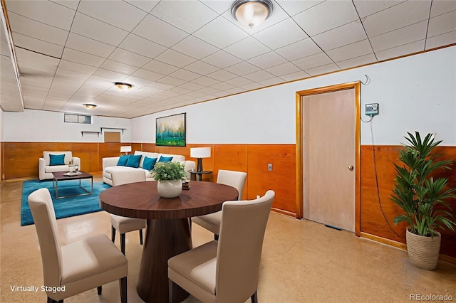 260 Flint Way, Broomfield, CO 80020 - dining room with wooden walls and a wainscoted wall