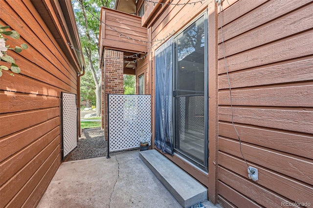 view of side of home featuring a patio