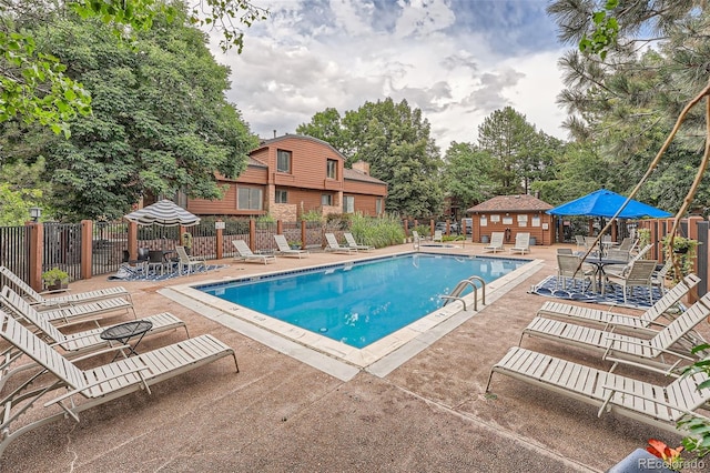 view of pool featuring a patio area