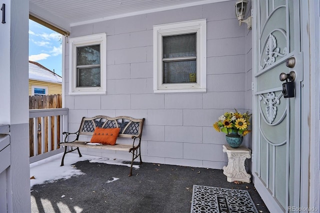 property entrance with covered porch