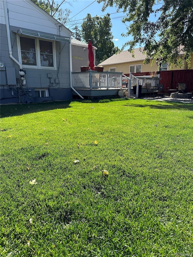 view of yard featuring a deck