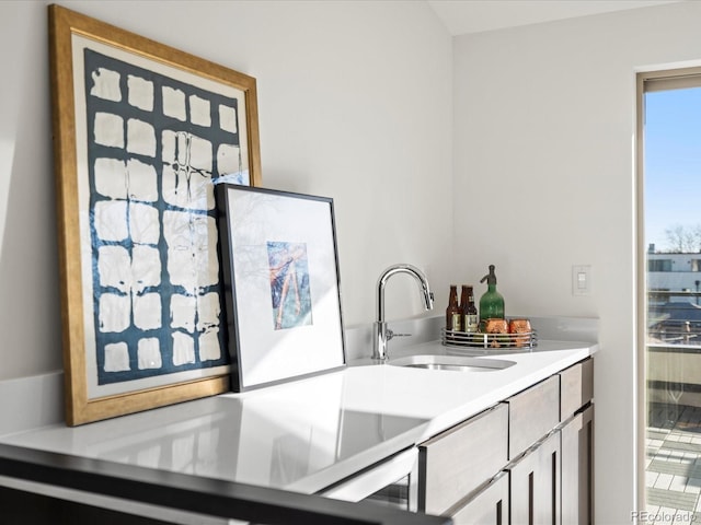 bar featuring a sink and wet bar