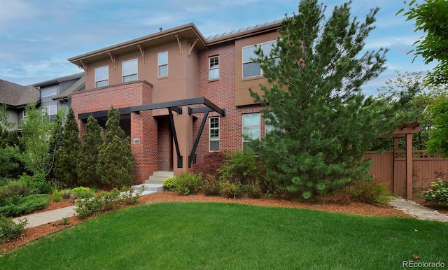 8044 E 24th Ave, Denver, CO 80238 - view of front of house with brick siding and stucco siding