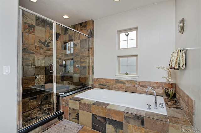 8044 E 24th Ave, Denver, CO 80238 - bathroom featuring a garden tub, a shower stall, and recessed lighting