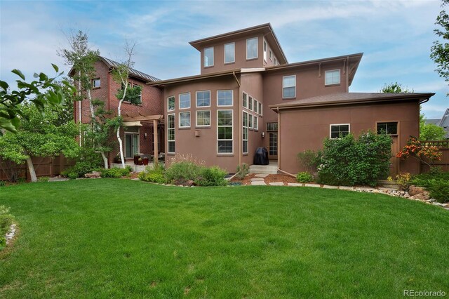 8044 E 24th Ave, Denver, CO 80238 - rear view of house featuring stucco siding