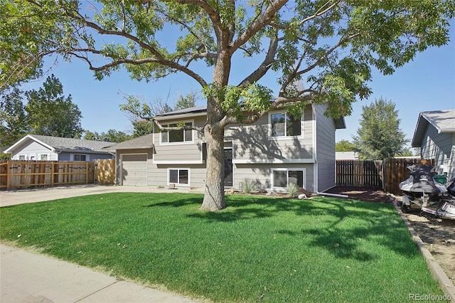 back of house featuring a yard