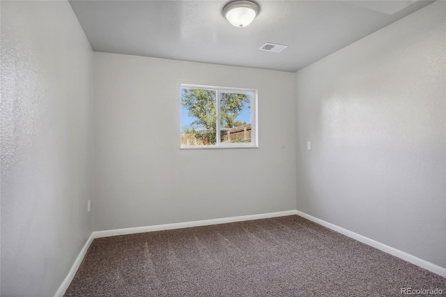 spare room featuring carpet flooring