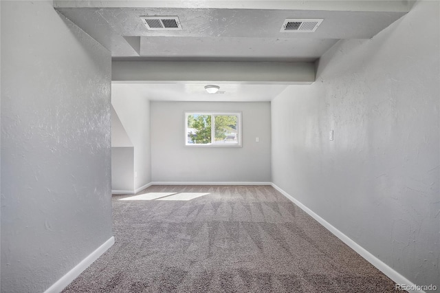 spare room featuring carpet flooring