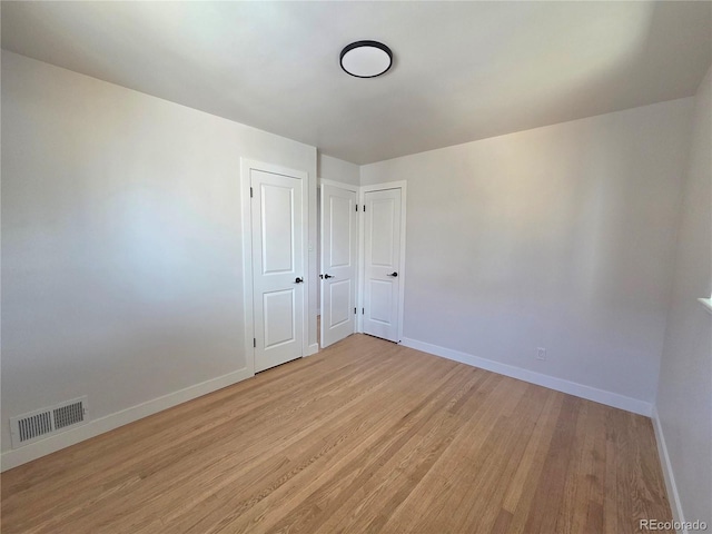 3541 Eudora St, Denver, CO 80207 - empty room featuring light wood-style floors and baseboards