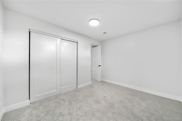 3541 Eudora St, Denver, CO 80207 - unfurnished bedroom featuring carpet, baseboards, and a closet