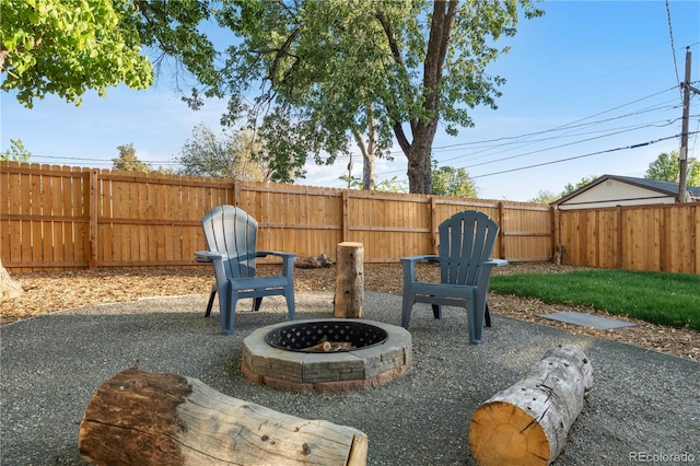 3541 Eudora St, Denver, CO 80207 - view of patio featuring a fire pit and a fenced backyard