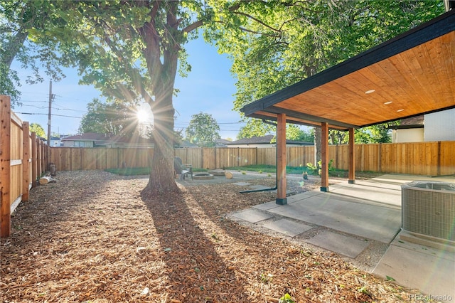 3541 Eudora St, Denver, CO 80207 - fenced backyard featuring a patio and cooling unit