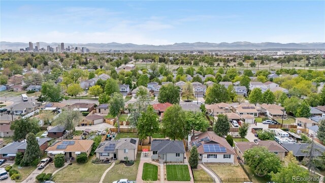 3541 Eudora St, Denver, CO 80207 - view of property location with nearby suburban area and a mountainous background