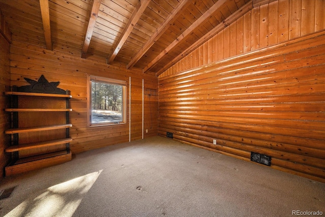 carpeted empty room featuring lofted ceiling with beams, wood ceiling, log walls, and visible vents