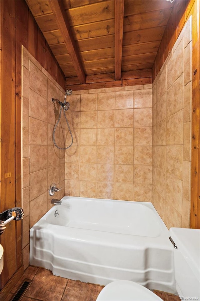 full bathroom featuring toilet, wooden ceiling, visible vents, and beamed ceiling