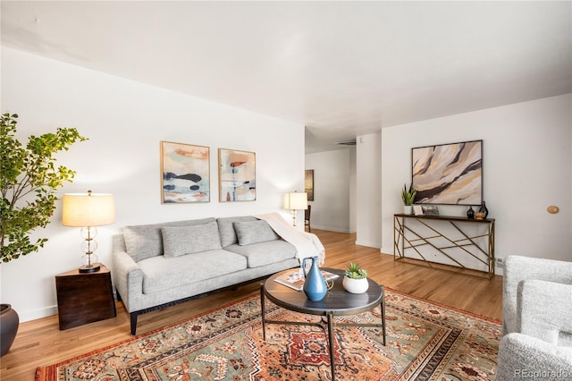 3054 S Raleigh St, Denver, CO 80236 - living area with wood finished floors and baseboards