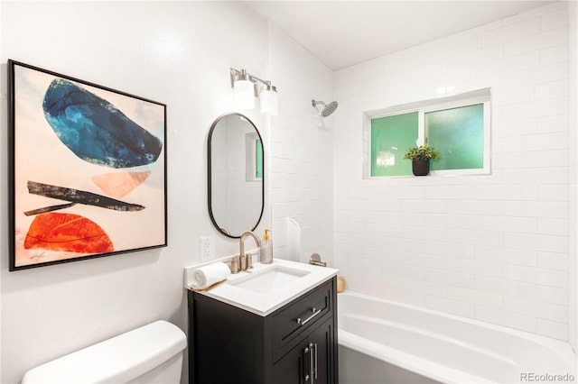 3054 S Raleigh St, Denver, CO 80236 - bathroom featuring vanity, toilet, and tub / shower combination