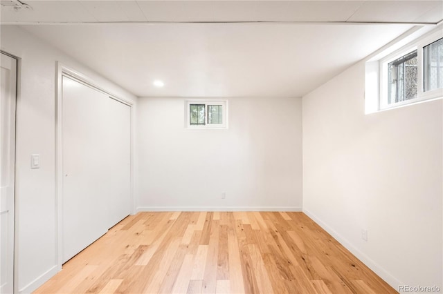 3054 S Raleigh St, Denver, CO 80236 - below grade area with light wood-style floors, baseboards, and recessed lighting