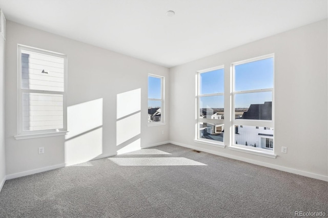 view of carpeted spare room