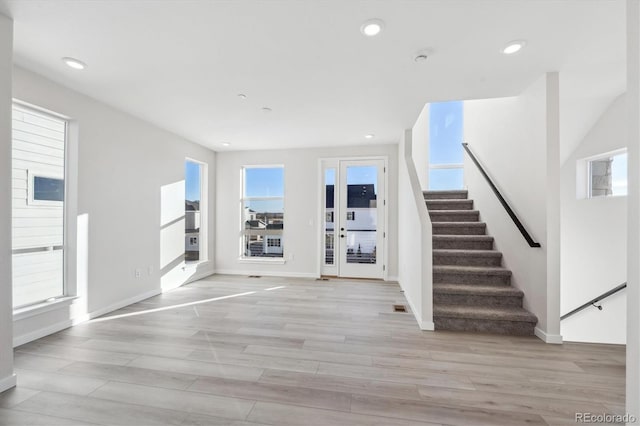 foyer entrance featuring light wood-type flooring