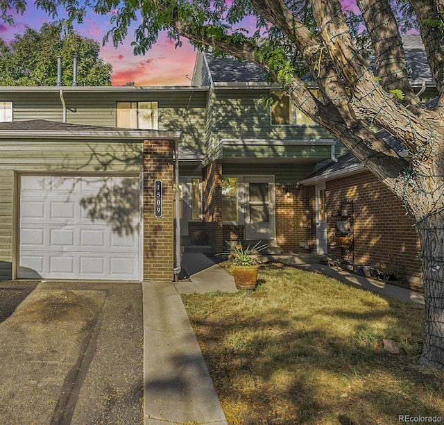 view of front of house with a lawn