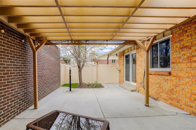 view of patio with fence