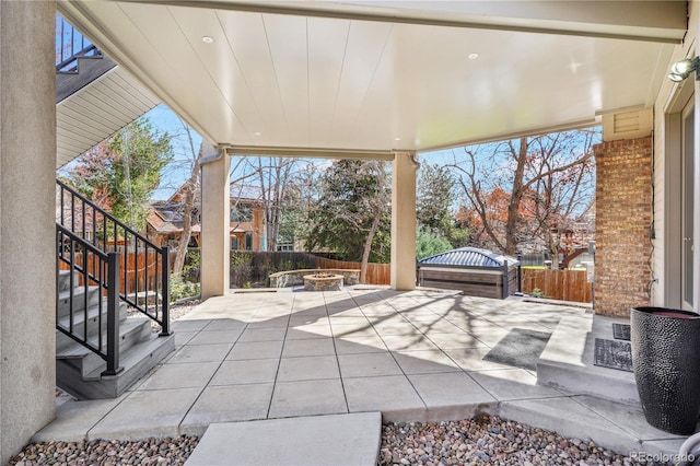 11465 W Atlantic Ave, Lakewood, CO 80227 - view of patio / terrace featuring a fire pit, a fenced backyard, and stairs