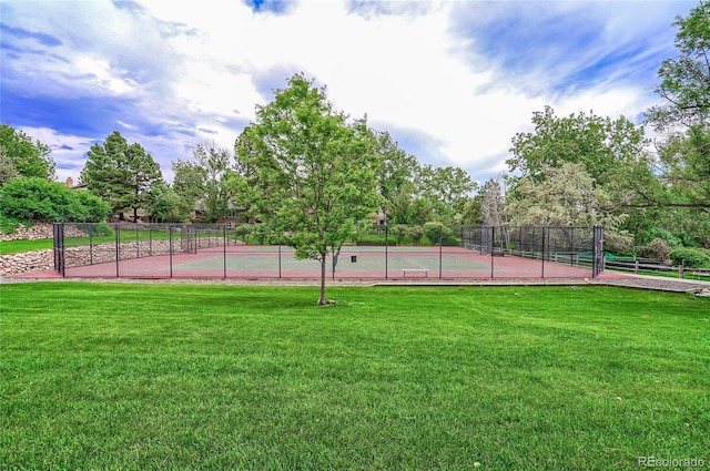 11465 W Atlantic Ave, Lakewood, CO 80227 - view of tennis court with view of wooded area